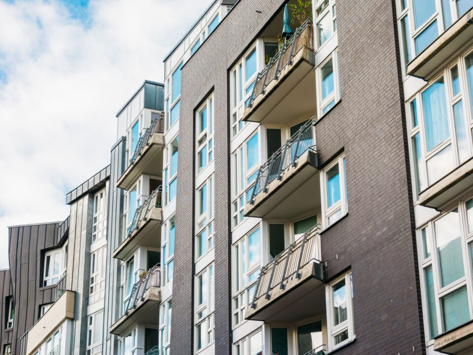 Brick apartment building with balconies