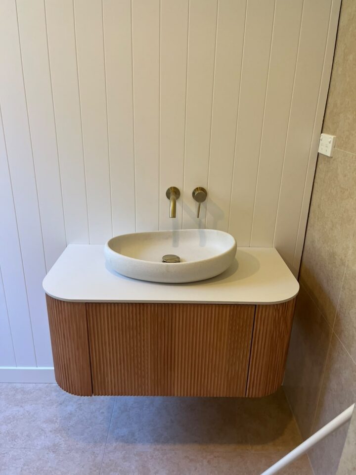Finished bathroom vanity with tapware installed