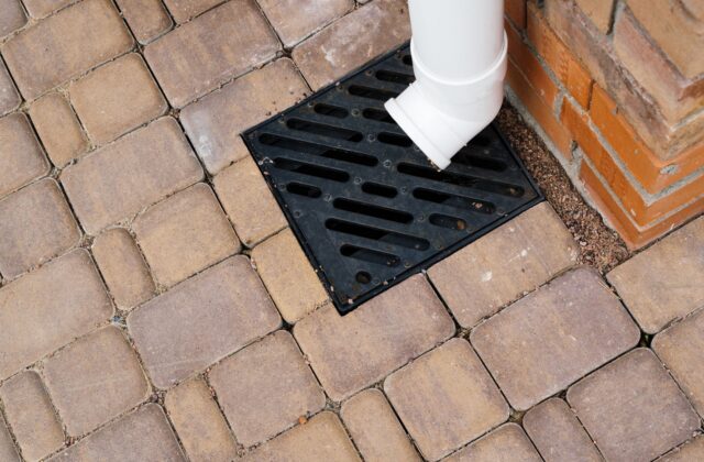 Drainage channel set into a brick patio