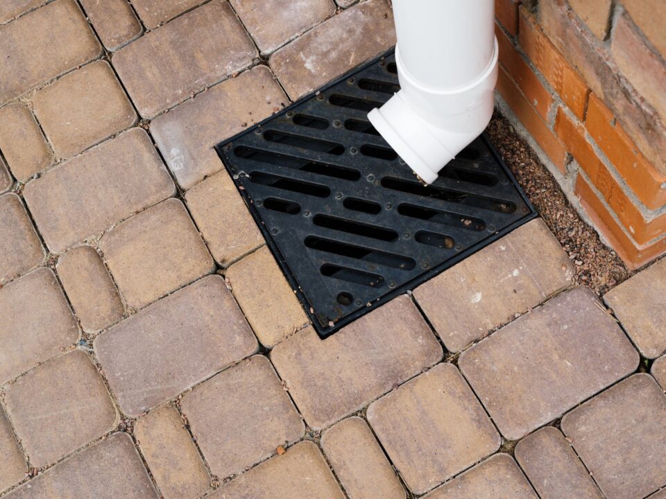 Drainage channel set into a brick patio